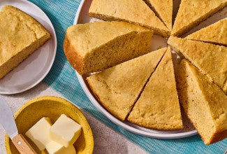 Cornbread sliced and arranged on a plate