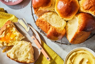 Japanese Milk Bread Rolls arranged on a table and seen from above.