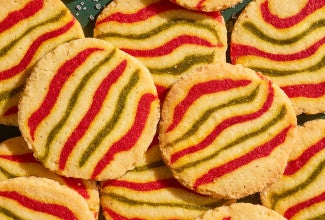 Ribboned Peppermint Shortbread Cookies stacked and arranged seen from above