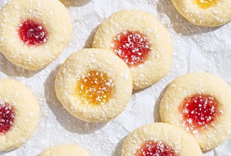 Almond Thumbprints on a white textured background