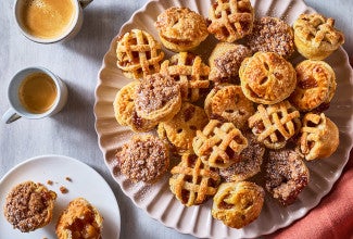 Lots of Mini Apple Pies arranged on a plate