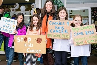 Gretchen and Ella at a bake sale