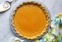 A pumpkin pie with a no-roll pie crust ready to be served