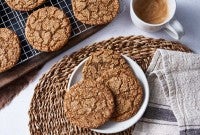 Spiced rye ginger cookies on plate and cooling rack