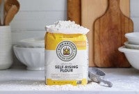 Bag of self-rising flour on counter
