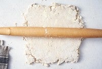 Rye puff pastry being rolled out