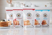 Pancake mixes lined up on the counter