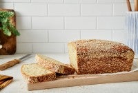 Sliced tahini pound cake with sesame seed crust