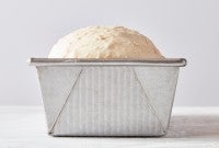 Bread dough proofing in sandwich loaf pan