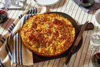 Baked latke focaccia on a cutting board