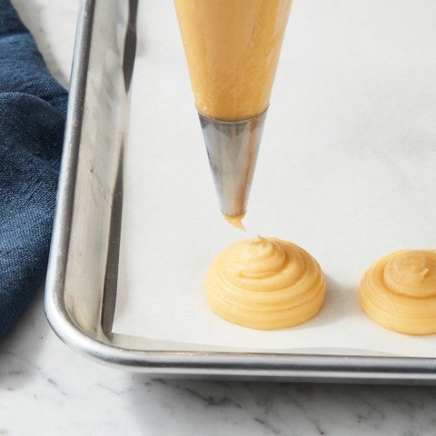 Piping cream puff batter