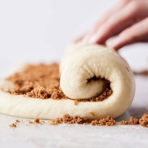 Rolling sweet bread dough - select to zoom