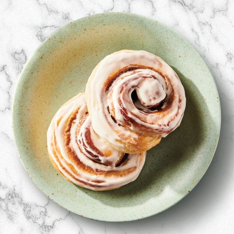 Two cinnamon buns on a plate - select to zoom