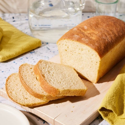 Sliced sourdough bread on a countertop. - select to zoom
