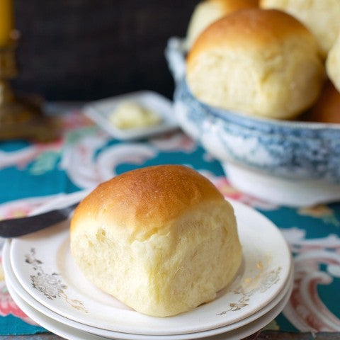 An Amish dinner roll on a plate. - select to zoom