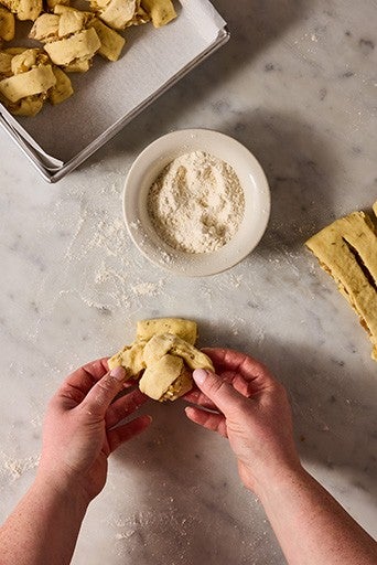 Knotted french onion roll dough.