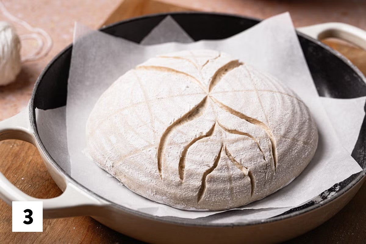 Close up of in progress sourdough scoring design for a mod pattern