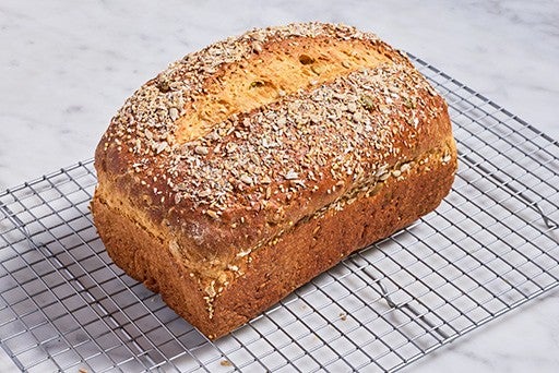 Multigrain Protein Bread on cooling rack, fresh out of the oven.