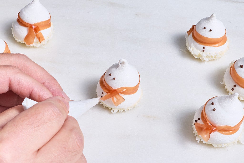 Decorating Snowman Meringues