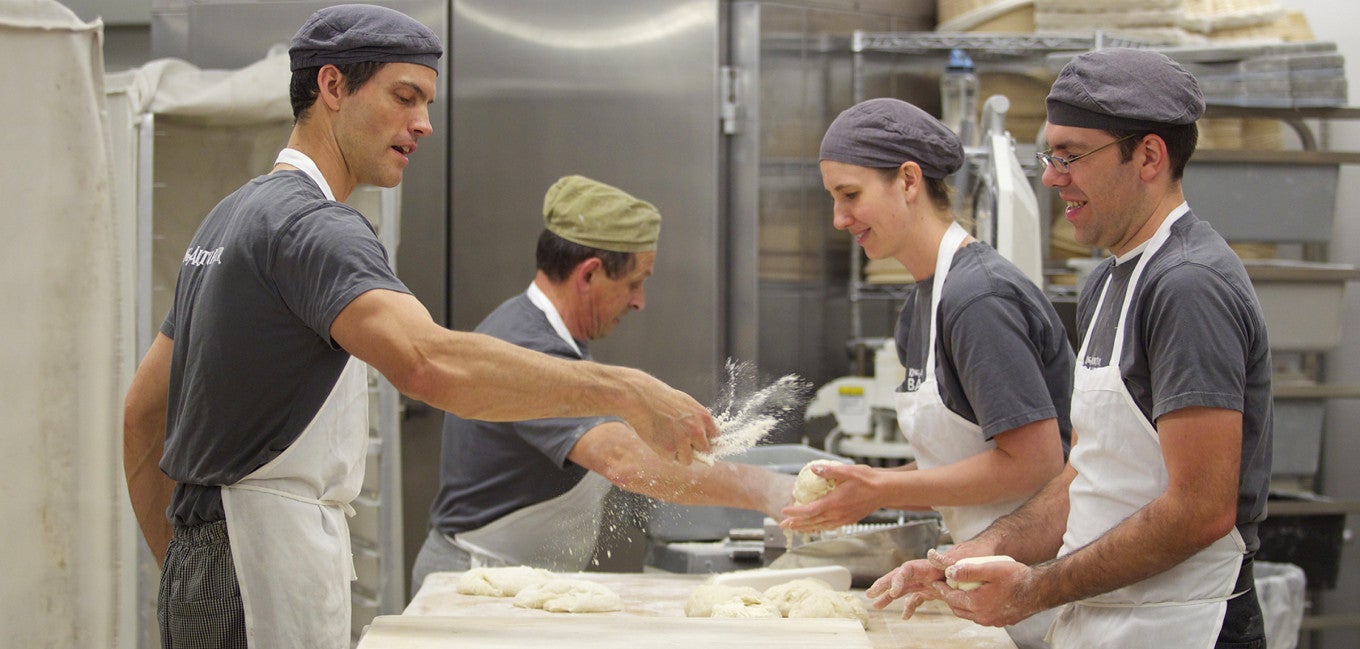 King Arthur Bakers at work making bread