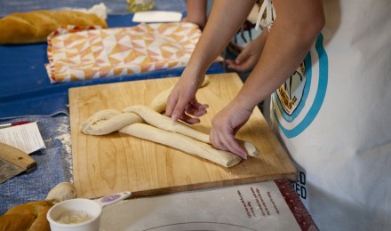 Braiding dough in a Bake For Good demonstration