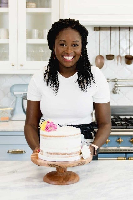 Zainab in the kitchen with cake