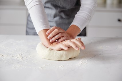 Hands kneading dough 