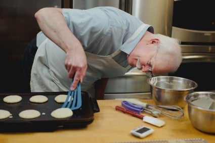 Frank making pancakes in the test kitchen