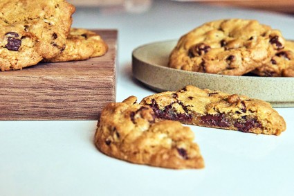 Air fryer chocolate chip cookies cut in half to show gooey center
