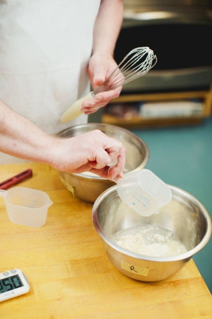 Add dry mix to wet ingredients already in the mixing bowl