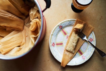 Tamal being served on a plate