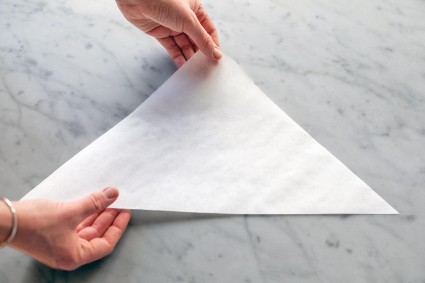 Parchment paper cut into a triangle 