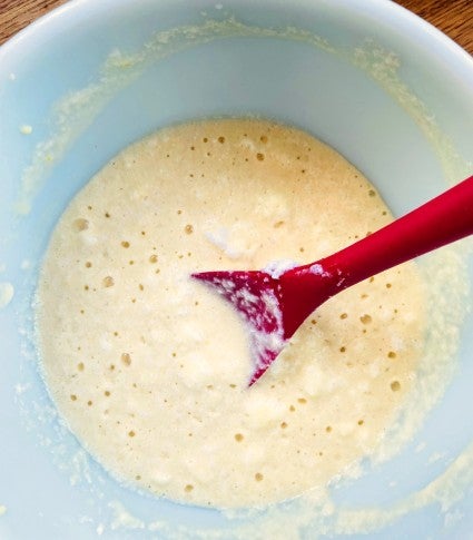 Kaiserschmarrn batter stirred together, ready to cook.