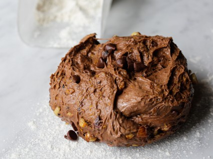 Chocolate stollen dough bursting with chocolate and hazelnuts