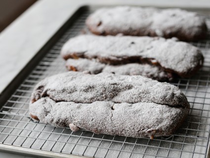 Chocolate stollen loaves dusted with non-melting sugar