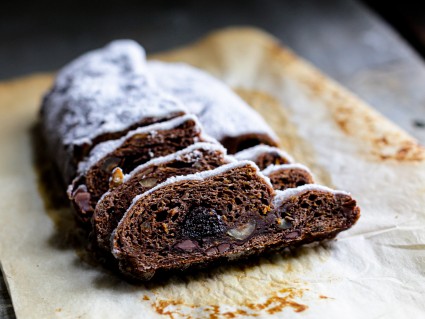 Slices of chocolate stollen showing hazelnut paste filling