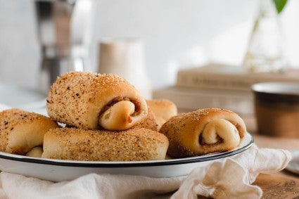 Senoriate Bread on a platter set on a breakfast table