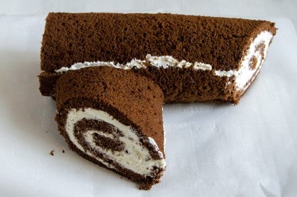 Undecorated yule log, with a large crack visible