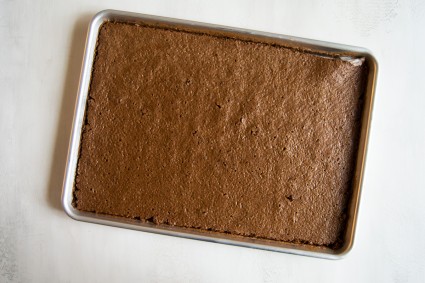 Baked chocolate cake in half sheet pan 