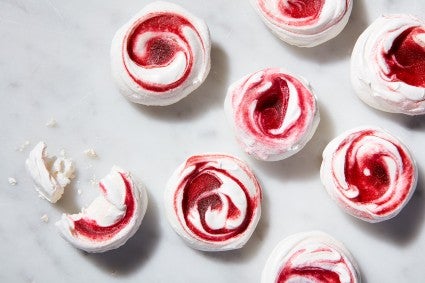 Meringues swirled with cranberry curd and lime