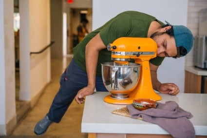 Arturo making Conchas de Maíz in his stand mixer