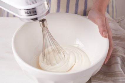Whipping marshmallows with a hand mixer