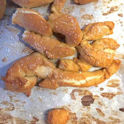 Broken up, misshapen pieces of yeast pretzel sprinkled with salt