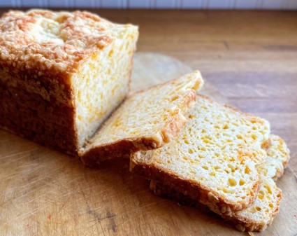 Cabot Cheddar Soda Bread bake din a rectangular loaf pan and sliced da board