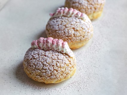 Crispy cream puffs with whipped cream and hibiscus