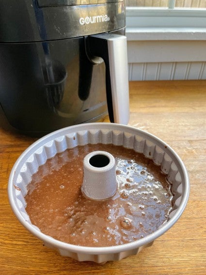 Chocolate cake batter in a half-size Bunt pan, ready to go into the air fryer.