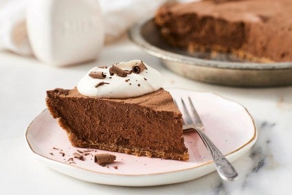 Slice of chocolate pie with graham cracker crust