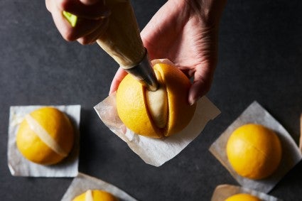 Steamed Carrot Bun being filled