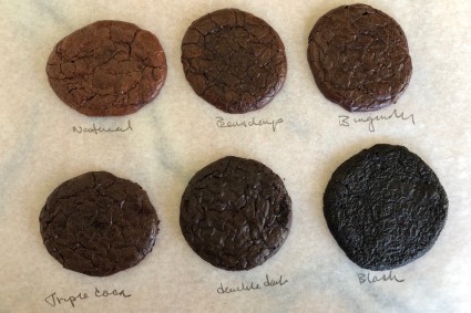 Cookies made with different cocoa powders next to each other