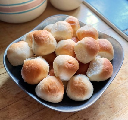 Pull-Apart Golden Butter Buns baked in an air fryer, then piled into a serving bowl.